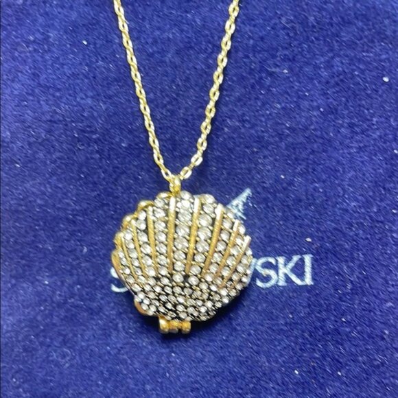 Swarovski | Jewelry | Swarovski Gold And Silver Shell Pendant Necklace ...